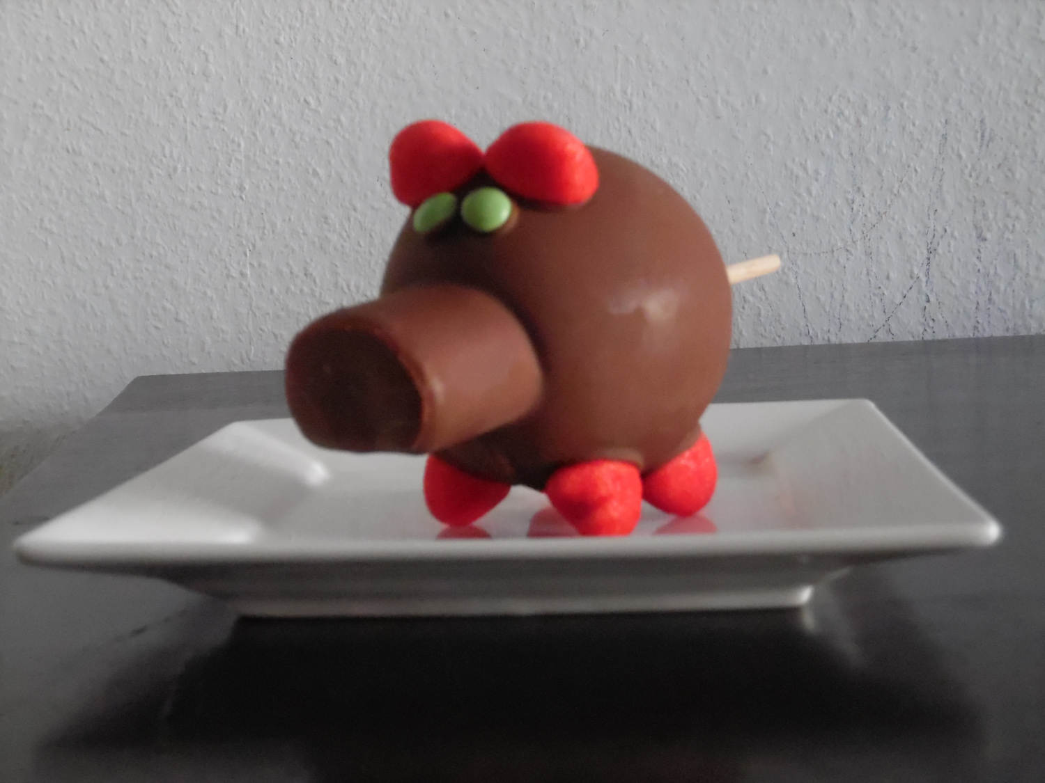 the Pig, chocolate covered apple with marshmallow snout